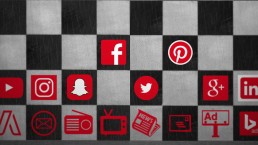 A chessboard with social icons depicting digital first